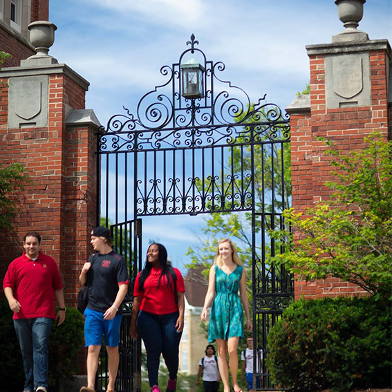 Students in front of Middle Campus gates