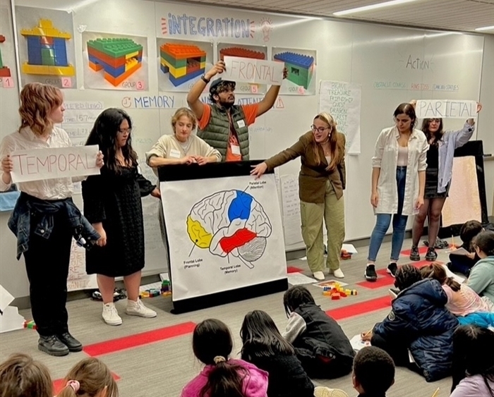 young children learning with lake forest students