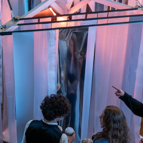 students interacting with art