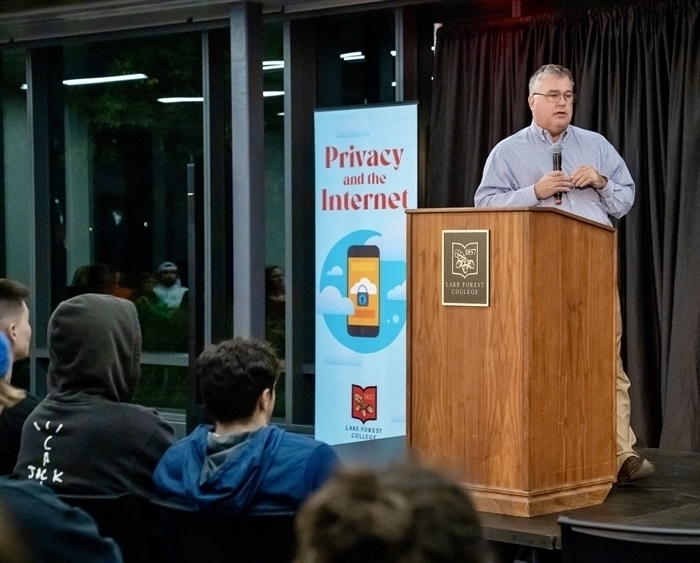 Fred Cate at podium with Privacy and the Internet banner behind 