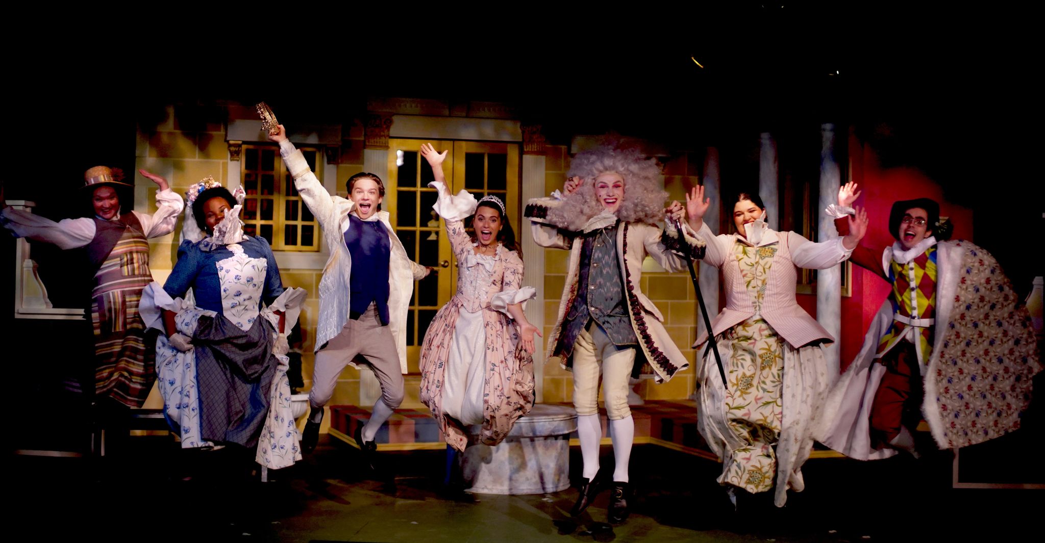 cast of triumph of love jumping on stage