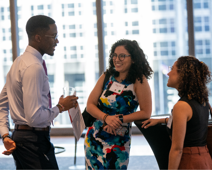 students chatting at the mixer