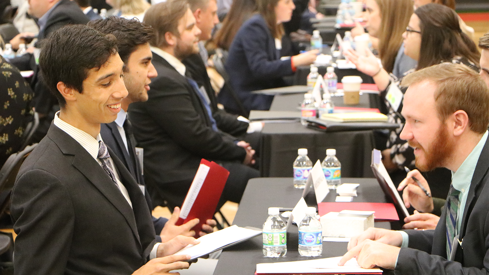 Students interviewing at Speed Networking