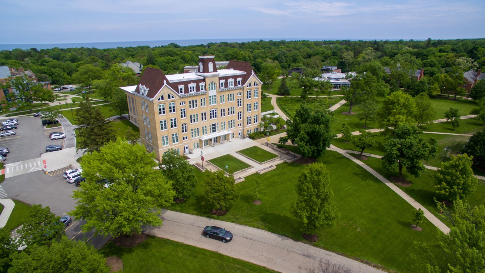 aerial view of Brown Hall with Lake Michigan in the background