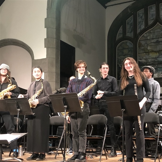 students in jazz band at a concert