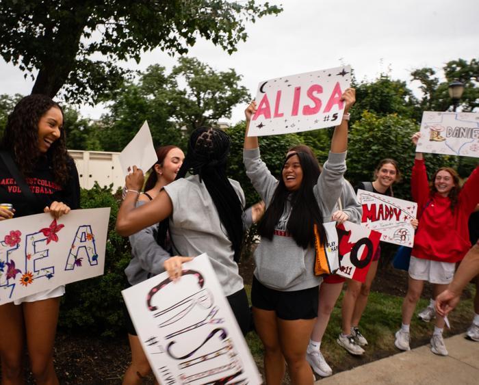 students cheer on first years