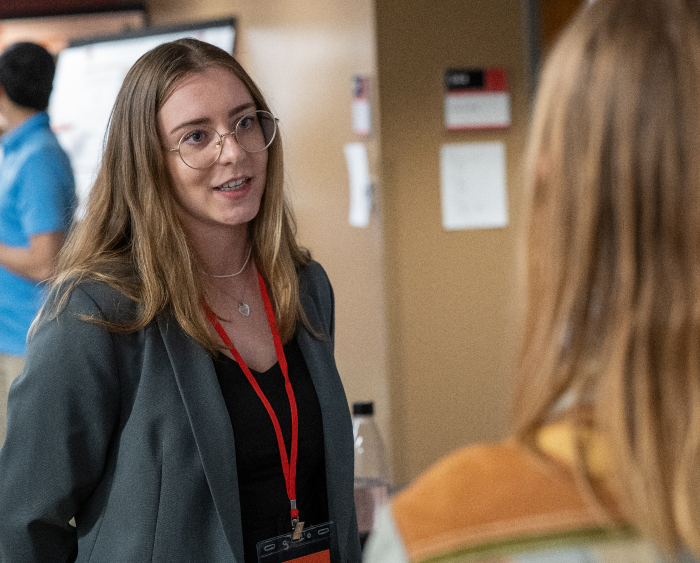 student presenting her research