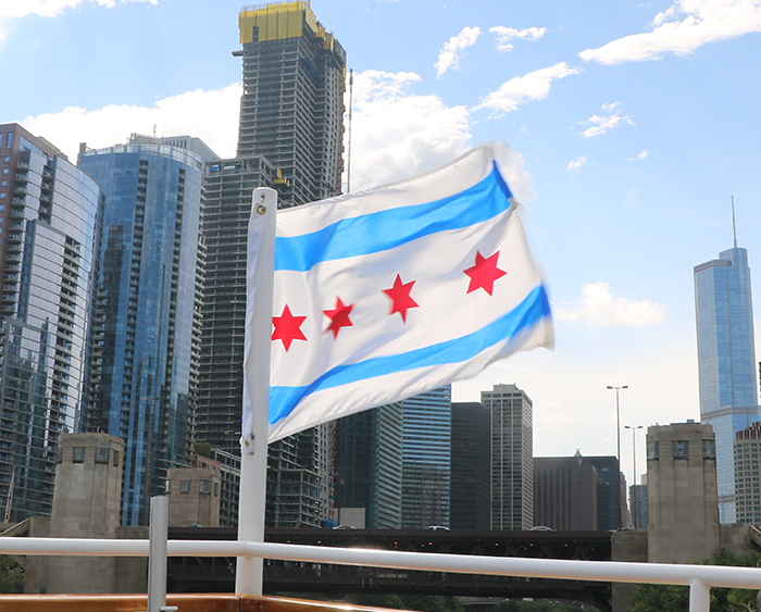 Chicago flag in front of city skyline