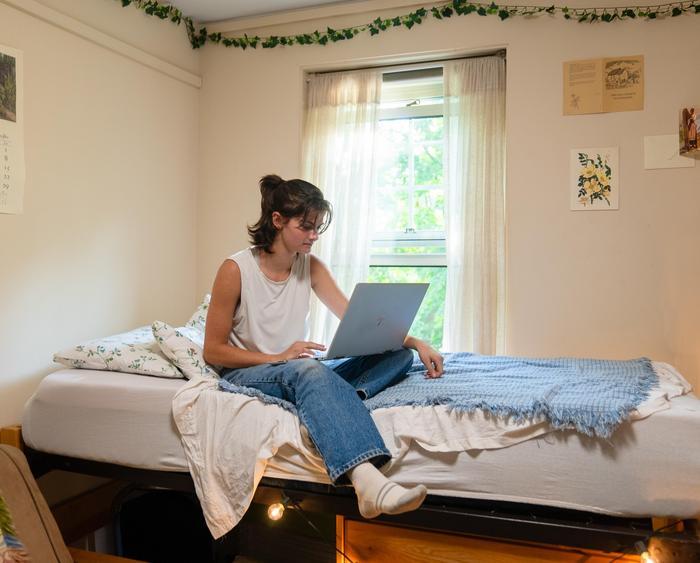 student in residence hall room