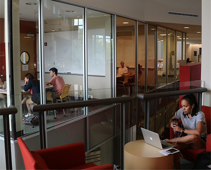 Students in library fishbowl