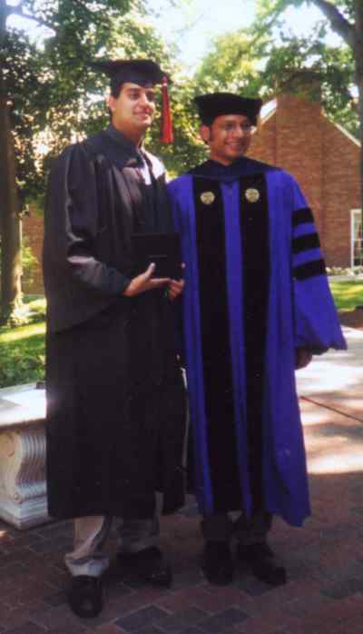 professor and student in graduation robes
