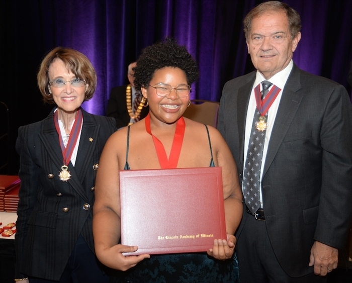 Student and representatives at Lincoln Laureate award ceremony