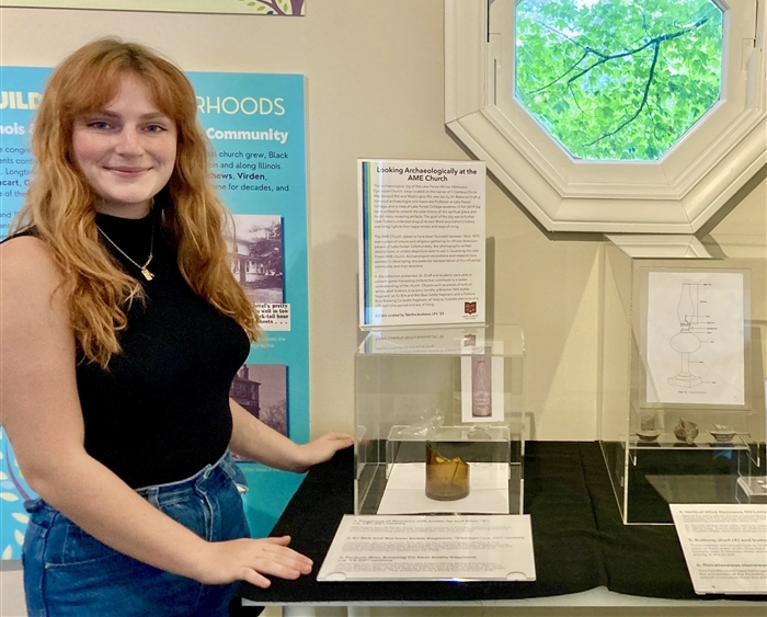 Student with museum exhibit