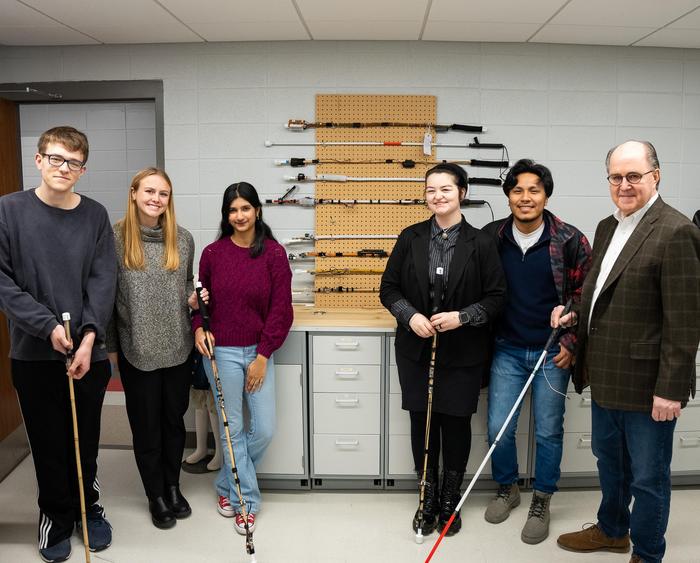 students working with prete in the lab