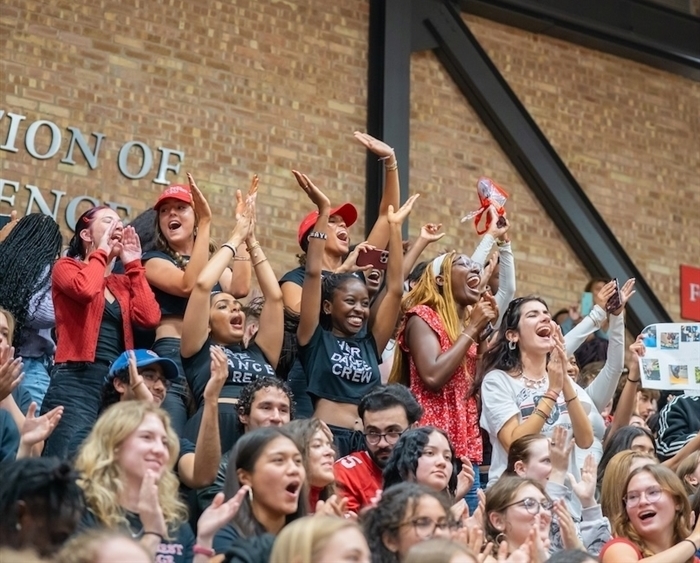 students cheering at pep rally