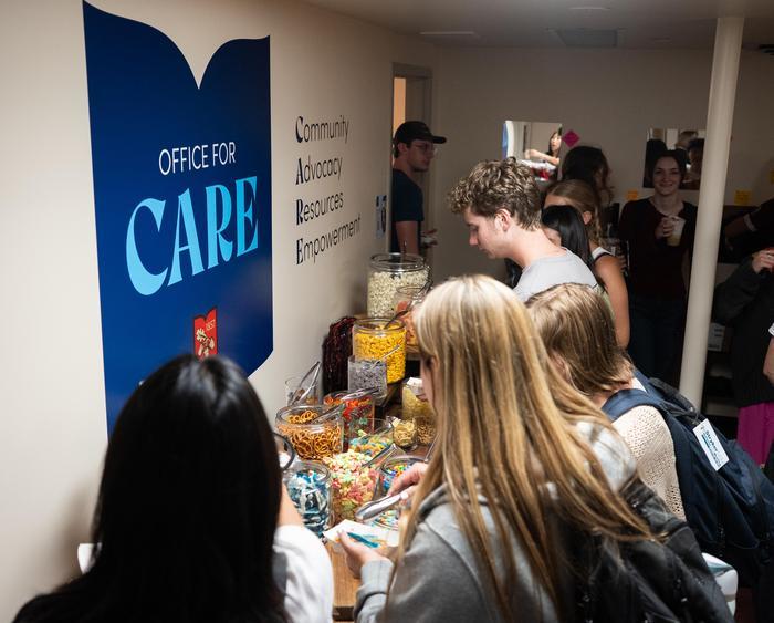 students gather at the care opening