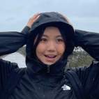 Student in rain jacket