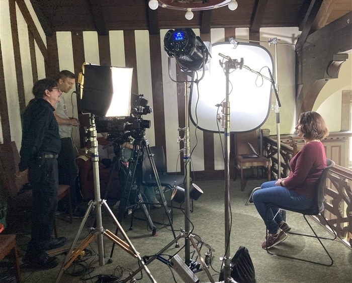 professor and film crew
