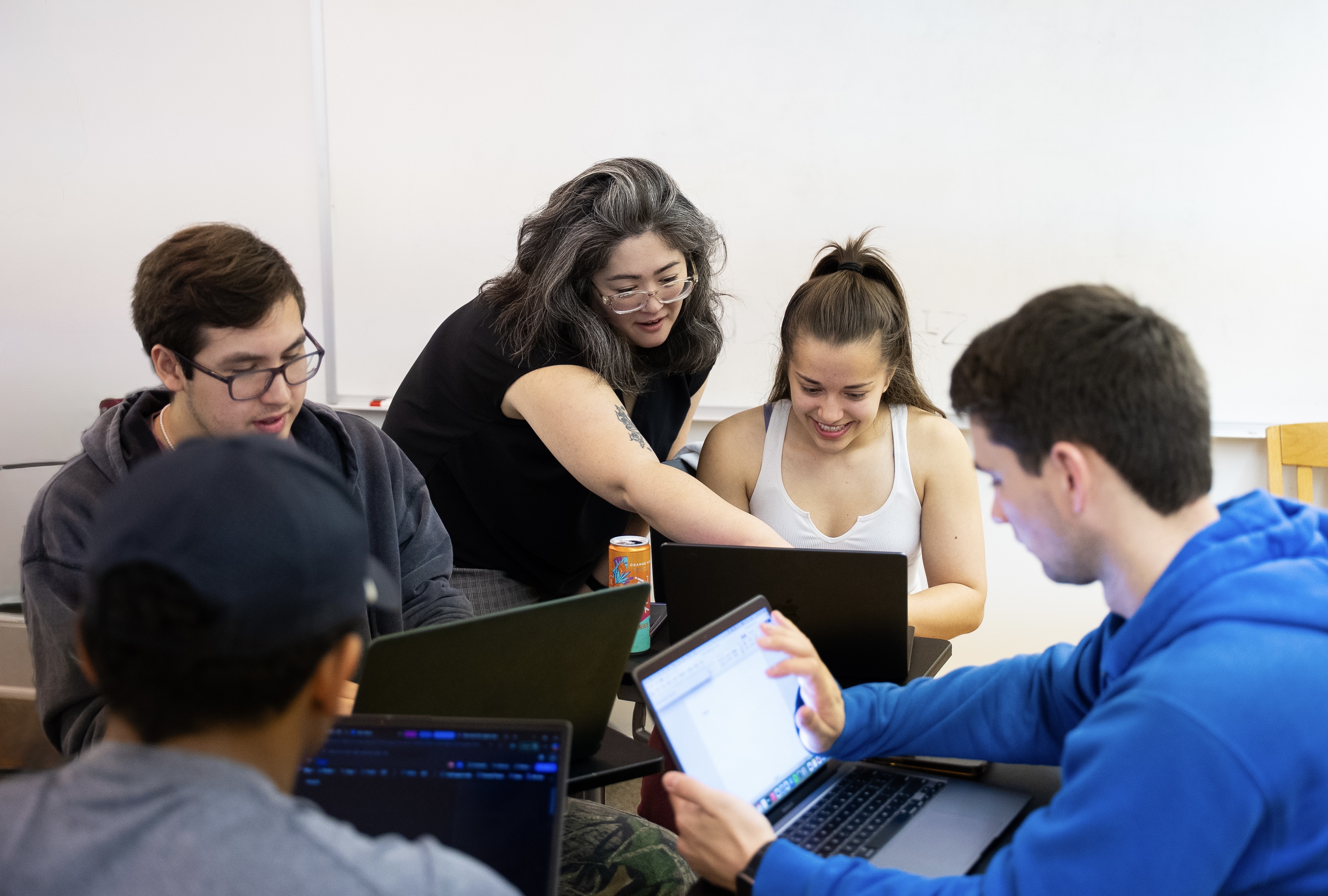 Professor working with students