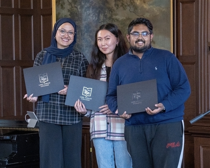 Students holding awards