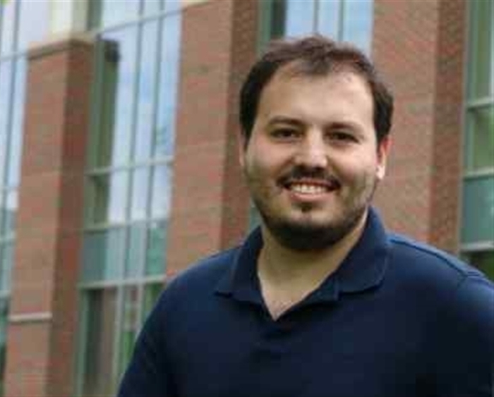 portrait of Enrique Trevino outside on Middle Campus