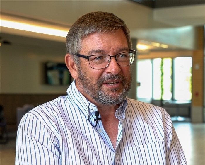 Professor Jeff Sundberg in lobby of Brown Hall 