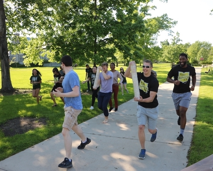 students competing in the plate race