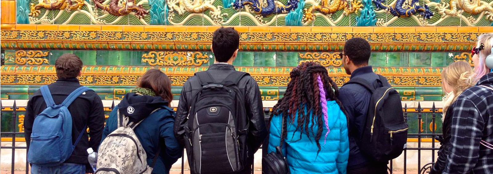 Students looking at a Chinese monument