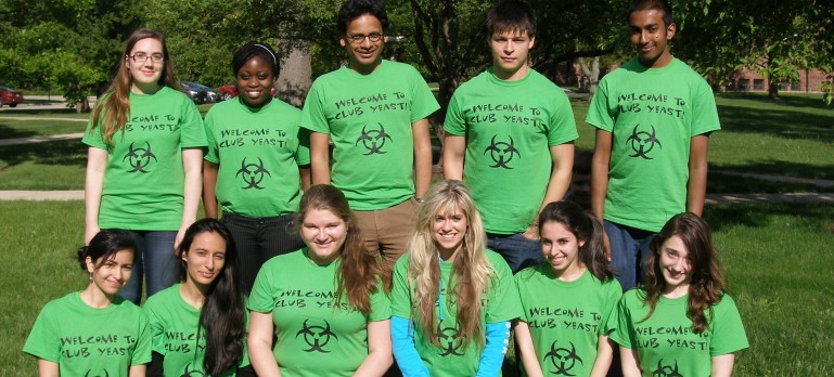 lab students and professor wearing matching T-shirts
