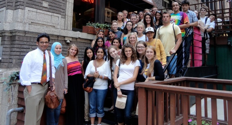 Students and professor on stairs