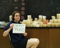 photo of student holding a yeast rocks sign