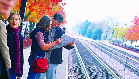 students wait to for the train