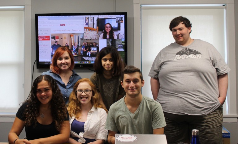 Digital Chicago's 2017 summer student researchers gather to share research notes, including students joining remotely via FaceTime.