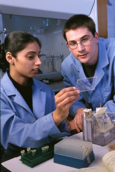 two students in research lab