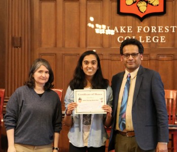 2020 Brain Bee champion with trophy