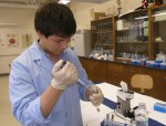 student working in lab