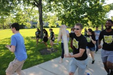 students competing in the plate race